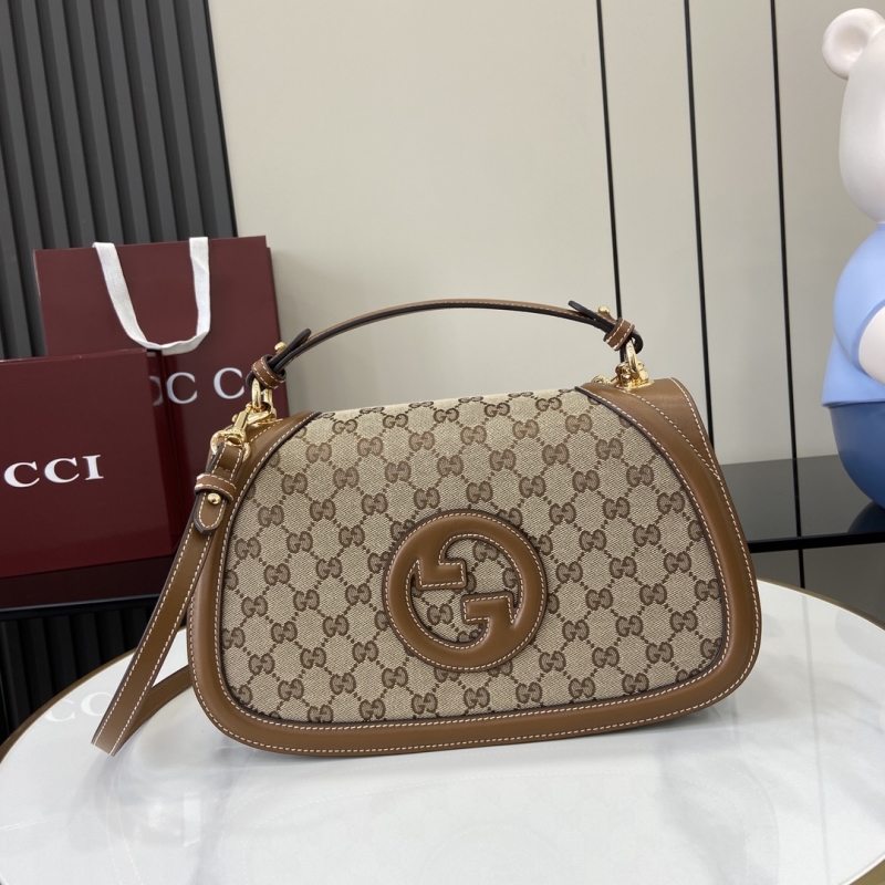 G*u*i top handle bags